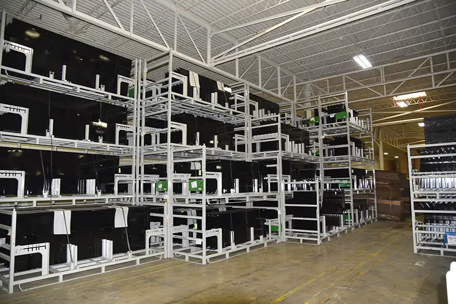 Returnable shipping rack loaded with products for industrial transport.